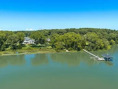 5243 Tickitank Way — riverside house with dock